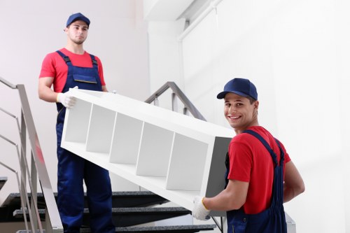 Staff assessing moving risks in a Chelsea property