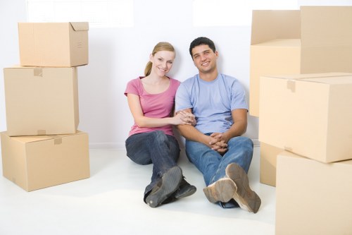 Professional movers handling furniture during a Chelsea student move