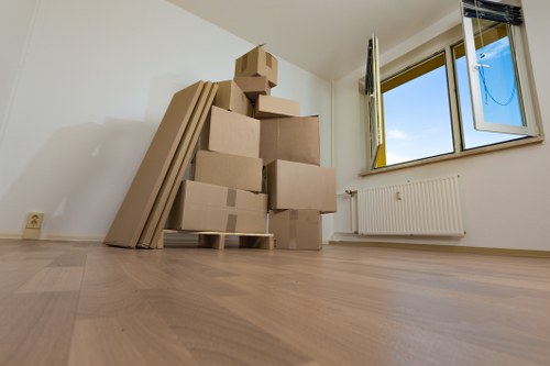 Professional man and van transporting furniture in Chelsea