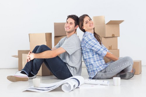 Estimator reviewing load-based moving costs for a Chelsea property