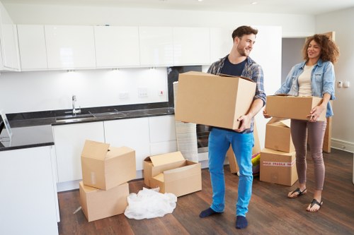 Packed moving boxes prepared for student removals in Chelsea