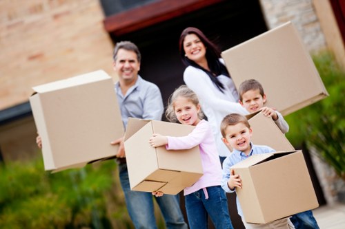 Professional removalists handling fragile furniture and valuables during a Chelsea move