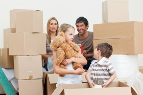 Loading a moving truck in Chelsea with furniture and boxes
